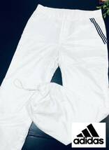 adidas　アディダス　中綿入りパンツ　ホワイト　スリーストライプ　裾コードストッパー　アウターパンツ　冬ゴルフ　レディースL_画像1