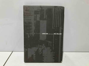 ブライアン・イーノ CD 【輸入盤】DRUMS BETWEEN THE BELLS-BRIAN ENO AND THE WORDS OF RICK HOLLAND(2CD+BOOK)