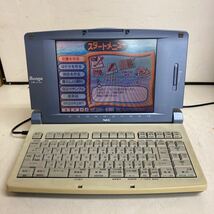 R509 NEC Bungo JX-720 パーソナルワードプロセッサ/ワープロ 本体のみ/通電OK 画面に線あり ジャンク品_画像1