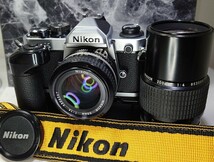 【終活整理】Nikon NEW FM2＋Ai NIKKOR 50mm f1.4＋200mm f4 単焦点2本セット＋モータードライブMD-12 各動作良好 露出計OK 光学連写OK _画像1