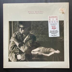 LP PAUL YOUNG / BETWEEN TWO FIRES