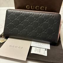 グッチ　GUCCI 財布　長財布　シマレザー　ハート金具　ラウンドファスナー　レディース_画像1