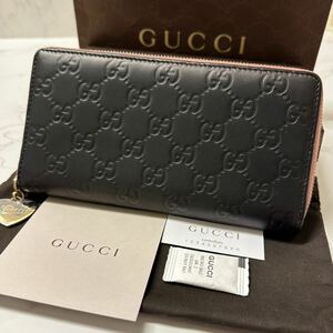 グッチ　GUCCI 財布　長財布　シマレザー　ハート金具　ラウンドファスナー　レディース