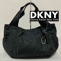 良品■DKNY ダナキャラン■ナイロン レザー トートバッグ チャーム付 黒 ブラック メタル&レザーチャーム_画像1