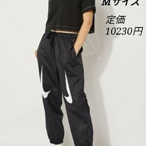 NIKE レディース Mサイズ ウーブンパンツ スウォッシュ NSW