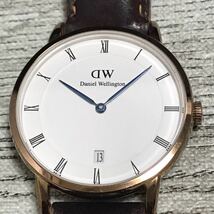 103-0007 Daniel Wellington ダニエルウェリントン B34R5 レディース腕時計 レザーベルト ブラウン 青針 電池切れ 動作未確認_画像2