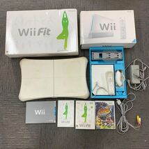 E012 Wii Wii Fit 任天堂 Nintendo ホワイト ヌンチャク ゲームソフト　マリオストライカーズチャージドWii Fit ジャンク品　中古品_画像1