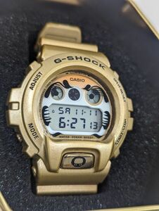 A117-231111-154【中古】CASIO G-SHOCK DW-6900GDA 達磨 ゴールド 動作品 腕時計