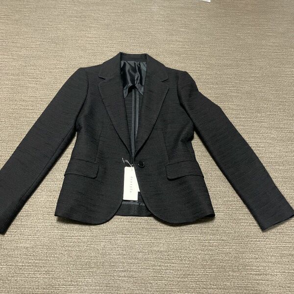 【タグ付き新品】おしゃれ生地のスーツ・ジャケット（THE SUIT COMPANY）定価2万円　レディース