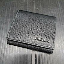 瑞(me1125-1) PRADA プラダ コインケース 小銭入れ ブラック 財布 銭入れ 黒 レザー メンズ レディース ユニセックス 使用感あり 中古_画像1