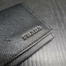 瑞(me1125-1) PRADA プラダ コインケース 小銭入れ ブラック 財布 銭入れ 黒 レザー メンズ レディース ユニセックス 使用感あり 中古_画像3