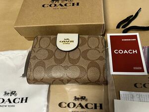 コーチ COACH 二つ折り 財布 ウォレット シグネチャー柄 カーキ ホワイト 白　アウトレット