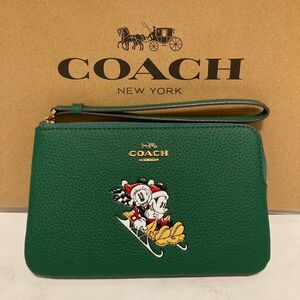 〜年末セール中〜　DISNEY COACH コーナー ジップ リストレット アイス スケート モチーフ グリーン