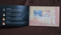 中国切手　2003 中国初有人宇宙飛行成功　切手帳　未使用　中国香港マカオ各2枚_画像3