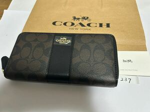 237 新品未使用 COACH コーチ 長財布 シグネチャー ラウンドファスナー アウトレット F54630