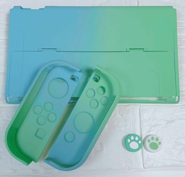 ブルーグリーン　肉球　可愛い　Nintendo Switch有機EL専用カバー　新型スイッチ専用ケース　任天堂　ハードタイプ