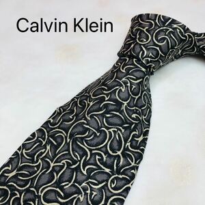 Calvin Kleinカルバン・クライン　ネクタイ　ハイブランド　ブラウン総柄　高級シルク100%