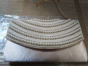  party back, light beige color satin ground, front surface cover part . pearl line stylish, chain attaching 