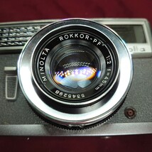 Q74【シャッターOK】MINOLTA 初代 Hi-matic レンズ固定式フィルムカメラ ミノルタ ハイマチック 箱付き CITIZEN UNI-E ROKKOR-PF F:2 45mm _画像2