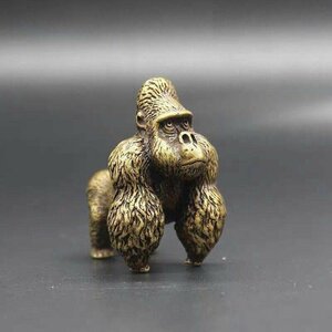 ゴリラの銅の芸の銅は猿の銅の手を愛します