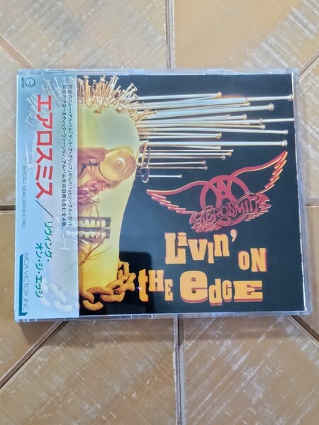 AEROSMITH エアロスミス CD「リヴィング・オン・ジ・エッジ」