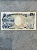 珍番（ゾロ目・切番）◆野口１０００円札ラスト　９０００００番　センター折れあり_画像2