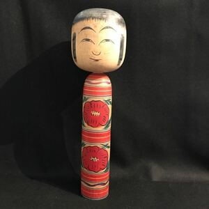  tradition kokeshi 268. earth toy elbow . Sato writing .