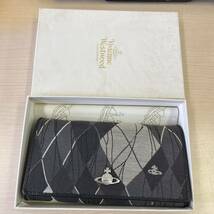 【T1206】Vivienne Westwood ヴィヴィアンウエストウッド 長財布 ブラック ラウンドファスナー 保存箱有り_画像1