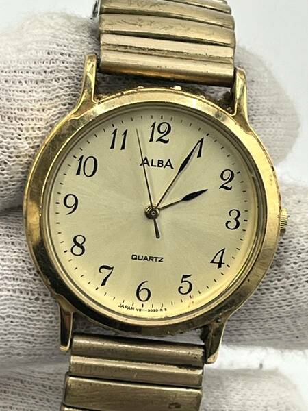 【電池切れ】SEIKO セイコー ALBA アルバ クォーツ 腕時計 ゴールド文字盤 ラウンド 蛇腹 スプリング レディース V811-0770