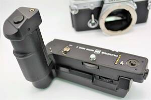 V^ OLYMPUS OM-1 motor Drive . battery pack . lithium ion rechargeable battery . exchange will do ^V