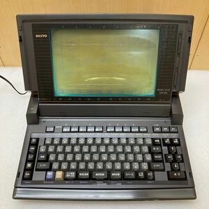 YK8382 SANYO サンヨー sanword70 [SWP-M70] ワープロ 通電OK ジャンク品 1127