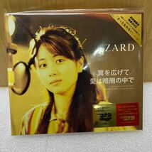 YK8735 未開封　ZARD『翼を広げて/愛は暗闇の中で』CD+DVD「きっと忘れない」【初回限定盤】名探偵コナンカード封入　現状品　1216_画像1