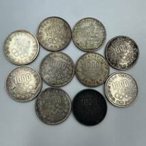 M012-558　記念硬貨　１０００円銀貨　１０枚　１９６４年　東京オリンピック　_画像1