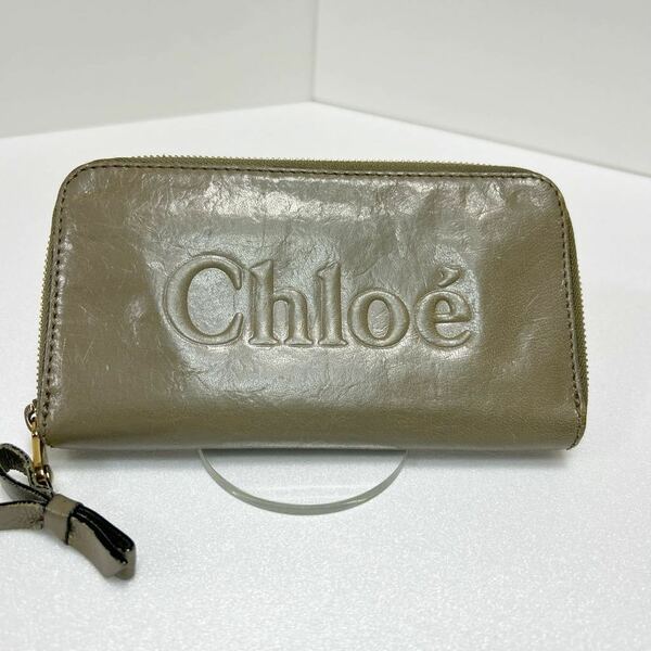 ◆Chloe クロエ 長財布◆　ラウンドジップ　レザー　小銭入れ有　ロゴ刻印　リボン　グレー 【USED】1219