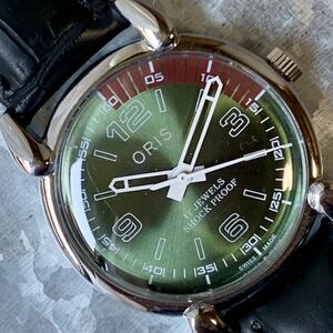  Oris * free shipping overhaul settled * men's wristwatch * hand winding * machine * Switzerland made * antique * Vintage * lime green *70s