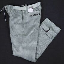 P661 新品 FILA GOLF フィラ ゴルフ 裏起毛 中綿 パンツ 裾ドローコード付き 撥水加工 蓄熱 保温 サイズM グレー_画像1