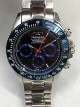 ジャンク TECHNOS クロノグラフ 腕時計 TSM401 文字盤ブラック ケースブルー系 テクノス 23120702_画像1