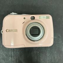 Z1114 動作品 Canon キャノン PowerShot E1 パワー ショット コットンピンク PC1338 動作確認済み バッテリー付属 デジカメ_画像1