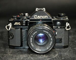 NY12-165【ジャンク品】Canon　A-1　フィルムカメラ　キャノン　一眼レフカメラ　カメラ　レンズ　FD 50㎜　1：1.8　動作未確認　中古品