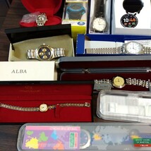 ケース入り腕時計まとめて CITTZEN CASIO ALBA Swatch NIXON LANCEL Paulsmith ANNE KLEIN courreges AUREOLE DISNEY など合計33個_画像9