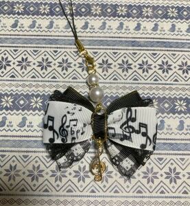 [2] piano * sound .* music * keyboard * simple * ribbon strap * key holder * swaying sound . charm attaching * lesson back *... bag 