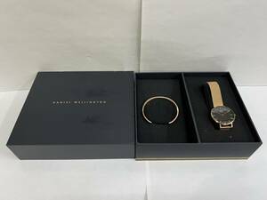 【DK-17745YB】Daniel Wellington ダニエルウェリントン E32R3 クオーツ ゴールド系 箱・バングル有 不動 ジャンク ※箱ダメージ有