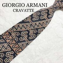 ■美品■GIORGIO ARMANI CRAVATTE ジョルジオアルマーニ　ネクタイ　遺跡の文字風　シルク100% イタリア製　ネイビー×オレンジ_画像1