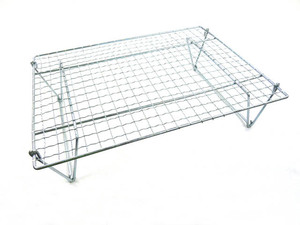 . rice field wire‐netting stand roaster ( gridiron ) with legs . net trivet replacement gotok replacement disposable independent independent type fish gridiron roasting . roasting roaster 