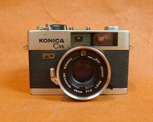 l006 Konica C35 FD レンジファインダー HEXANON 38mm F1.8 フィルムカメラ サイズ：約 幅11×高さ8×奥行6.5ｃｍ /60