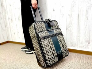 未使用展示品 COACH コーチ シグネチャー キャリーケース キャリーバッグ バッグ PVC×レザー グレー×黒 A4収納可 メンズ 67709