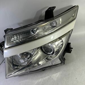 M　39-1-1エルグランド 前期 E52 TE52 HID 左 100-23009 ヘッドライト 