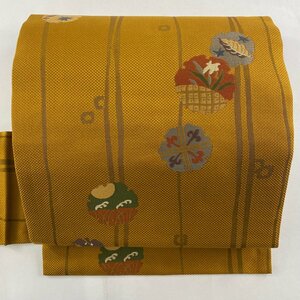 名古屋帯 美品 秀品 雪輪 よろけ縞 山吹茶色 正絹 【中古】