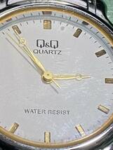 Q&Q腕時計　　丸型文字盤　　３針　　メタルベルト　　　中古稼働_画像2