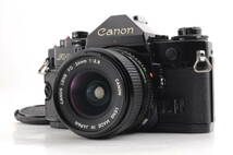 動作品 キャノン Canon A-1 レンズ NEW FD 24mm f2.8 黒 ブラック MF 一眼レフ フィルムカメラ 管K5466_画像1